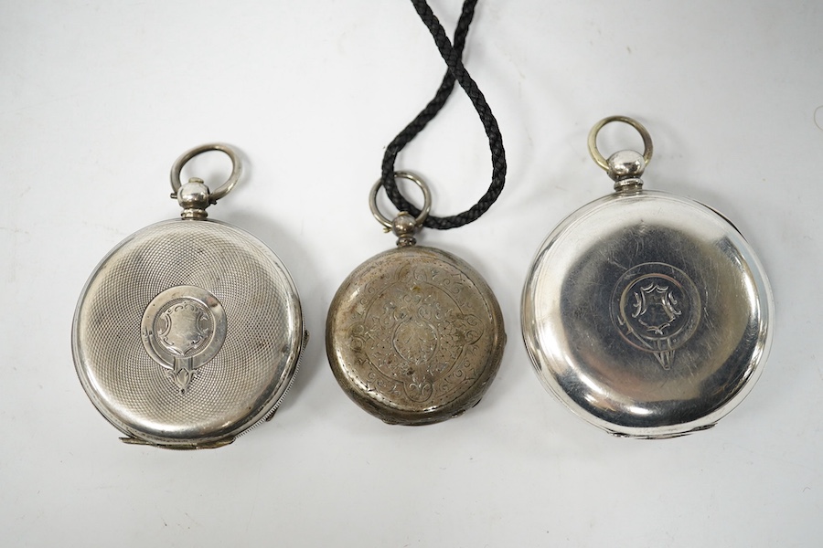 A George V Waltham silver open faced key wind pocket watch (a.f.), a 935 white metal open faced pocket watch and an 800 white metal fob watch. Condition - poor